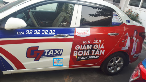 quảng cáo dán tràn đuôi xe taxi G7